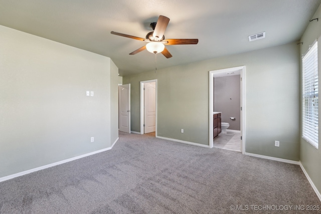 11088 N 116th E Ave, Owasso, OK 74055 - unfurnished bedroom with light colored carpet and baseboards