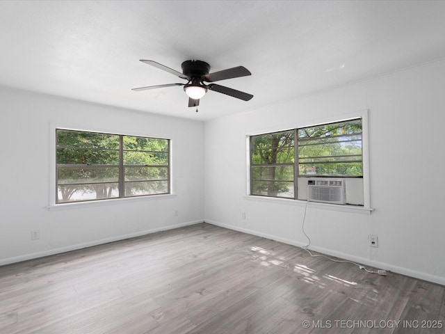 9 L B May Scenic Ln, Pawhuska, OK 74056 - unfurnished room featuring ceiling fan, wood finished floors, baseboards, and cooling unit