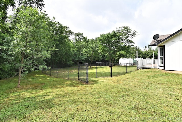 119 N 6th Mile, Fort Gibson, OK 74434 - view of yard featuring a gate