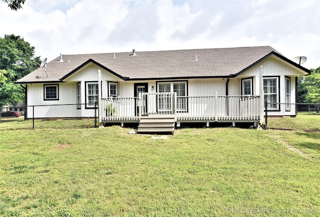 119 N 6th Mile, Fort Gibson, OK 74434 - rear view of property featuring a shingled roof and a wooden deck