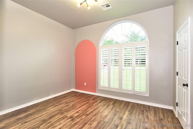 119 N 6th Mile, Fort Gibson, OK 74434 - unfurnished room featuring plenty of natural light, dark wood-type flooring, and baseboards