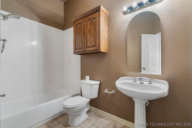 full bathroom featuring toilet,  shower combination, baseboards, and tile patterned floors