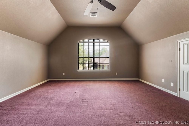 bonus room featuring carpet floors, vaulted ceiling, ceiling fan, and baseboards