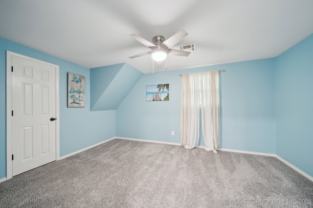 additional living space featuring carpet floors, ceiling fan, and baseboards