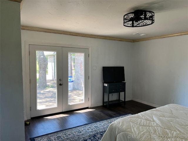 514 Lakeshore St, Durant, OK 74701 - bedroom with french doors, access to exterior, wood finished floors, ornamental molding, and baseboards