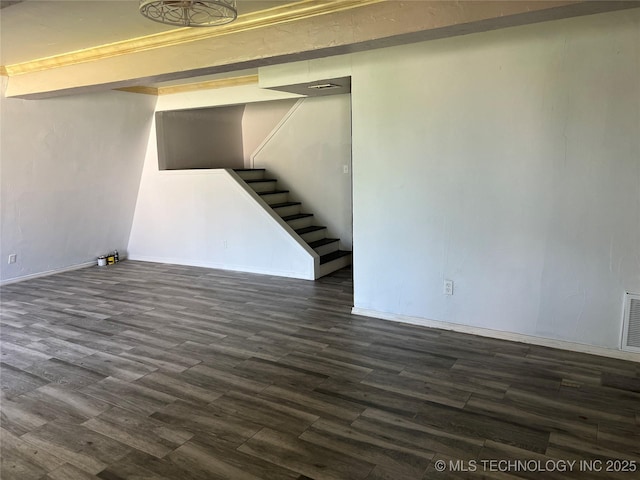 514 Lakeshore St, Durant, OK 74701 - finished basement featuring dark wood-style floors, stairs, and baseboards