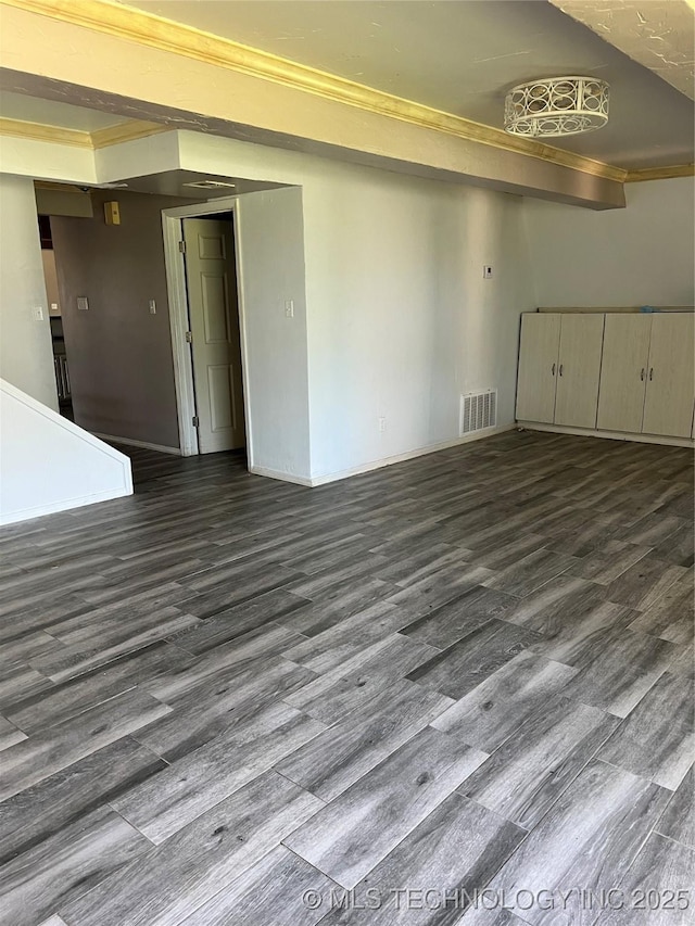 514 Lakeshore St, Durant, OK 74701 - empty room featuring dark wood finished floors, ornamental molding, and baseboards