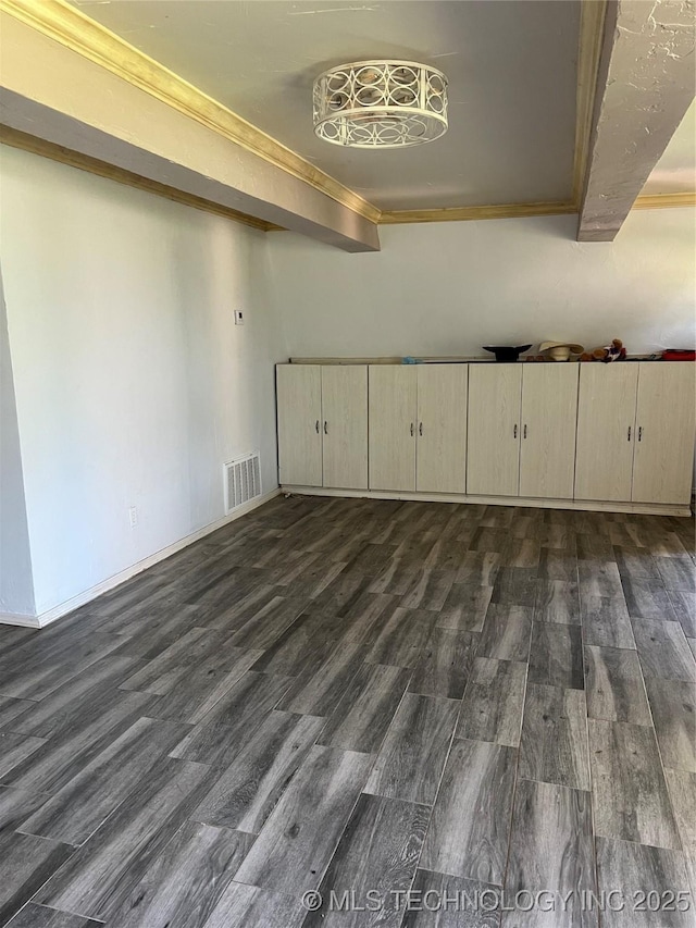 514 Lakeshore St, Durant, OK 74701 - unfurnished room with dark wood-type flooring and ornamental molding