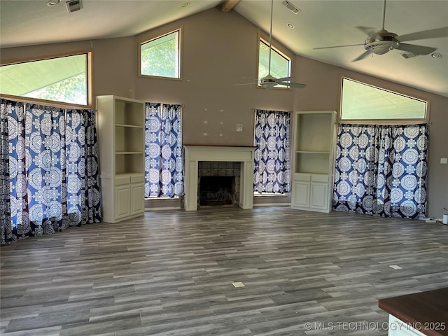 514 Lakeshore St, Durant, OK 74701 - unfurnished living room featuring ceiling fan, high vaulted ceiling, wood finished floors, and a fireplace