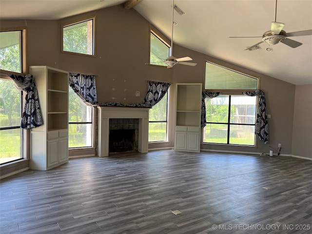 514 Lakeshore St, Durant, OK 74701 - unfurnished living room featuring a ceiling fan, wood finished floors, a fireplace, beam ceiling, and high vaulted ceiling