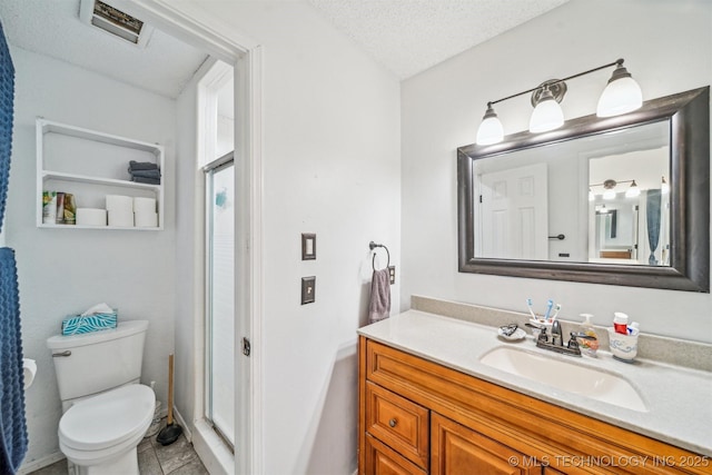 14516 E 36th St, Tulsa, OK 74134 - full bathroom with a shower stall, vanity, toilet, and a textured ceiling