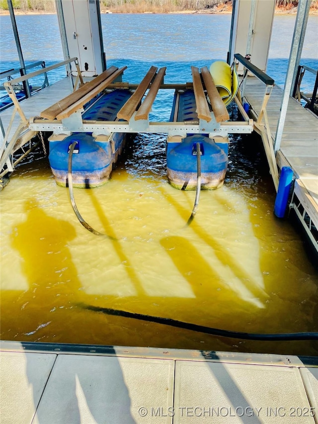 dock featuring boat lift