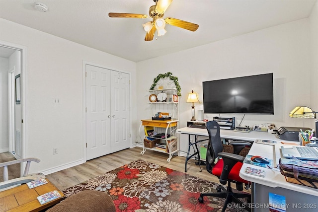 64 Floyd Everet, Colbert, OK 74733 - office with wood finished floors, a ceiling fan, and baseboards