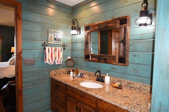 96729 S 4490, Vian, OK 74962 - bathroom with wooden walls and vanity