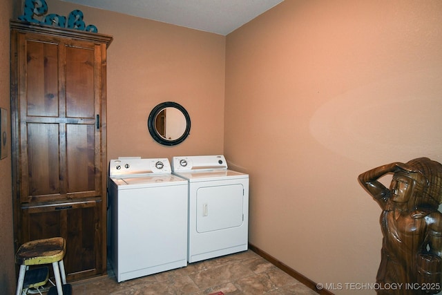 96729 S 4490, Vian, OK 74962 - washroom featuring independent washer and dryer, cabinet space, stone finish flooring, and baseboards
