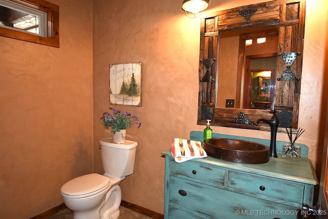96729 S 4490, Vian, OK 74962 - bathroom with toilet, vanity, and baseboards