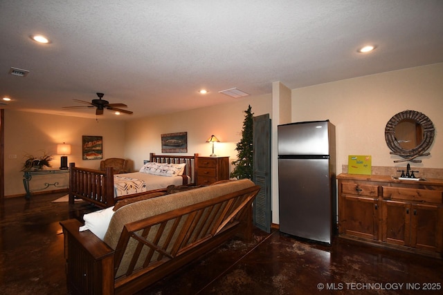 96729 S 4490, Vian, OK 74962 - bedroom with freestanding refrigerator, finished concrete floors, a sink, recessed lighting, and ceiling fan