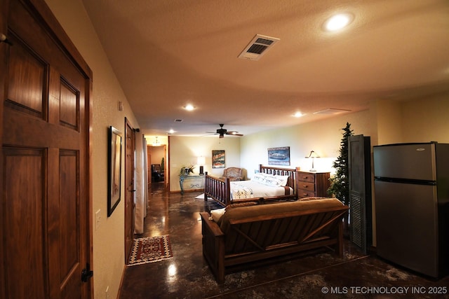 96729 S 4490, Vian, OK 74962 - bedroom with freestanding refrigerator, finished concrete floors, and recessed lighting