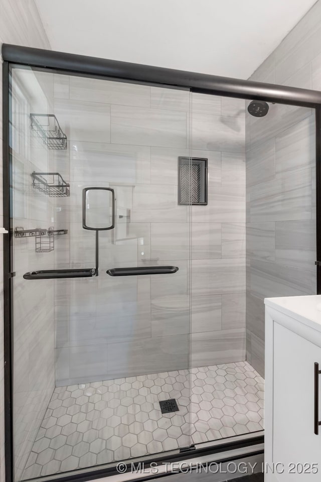 bathroom with a stall shower