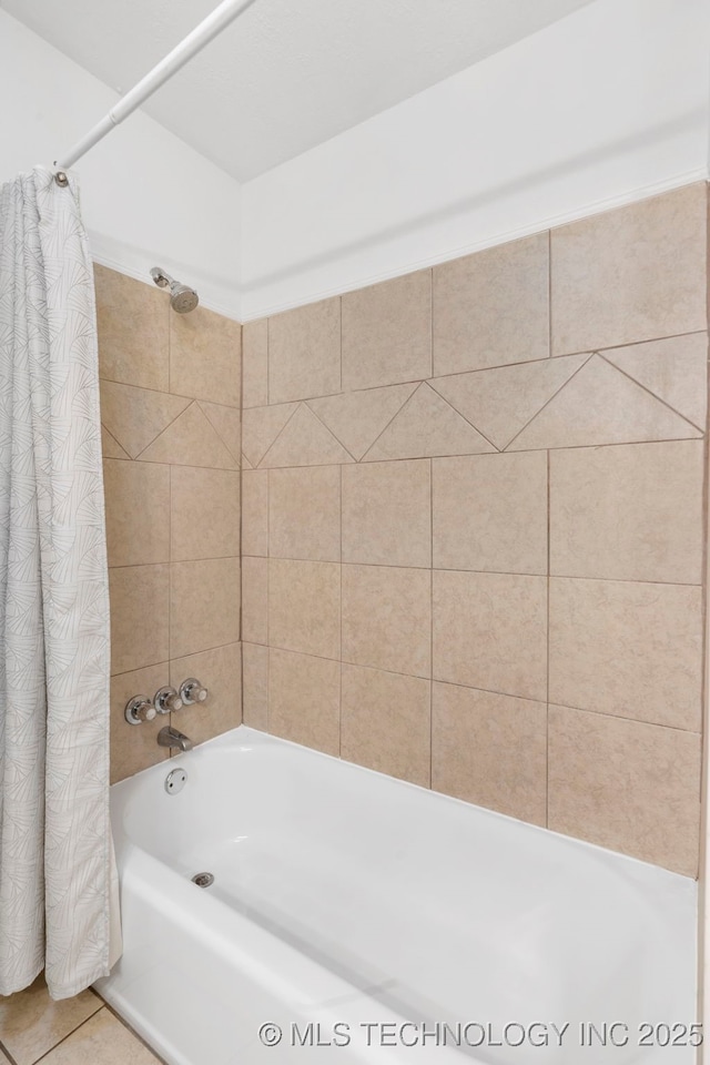bathroom featuring shower / tub combo and tile patterned flooring