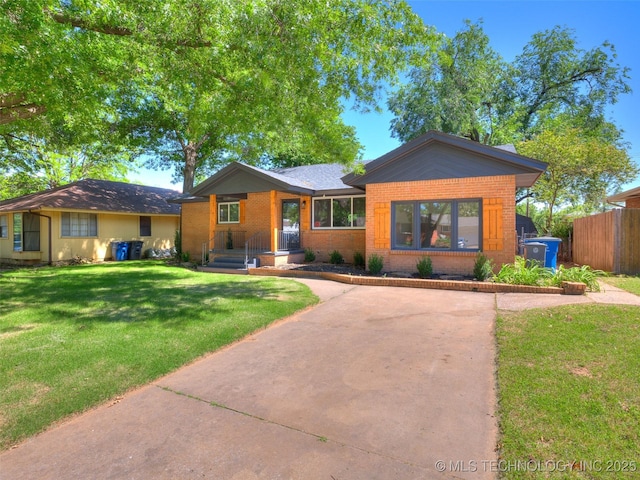 2528 E 57th St, Tulsa, OK 74105 - ranch-style home with brick siding and driveway