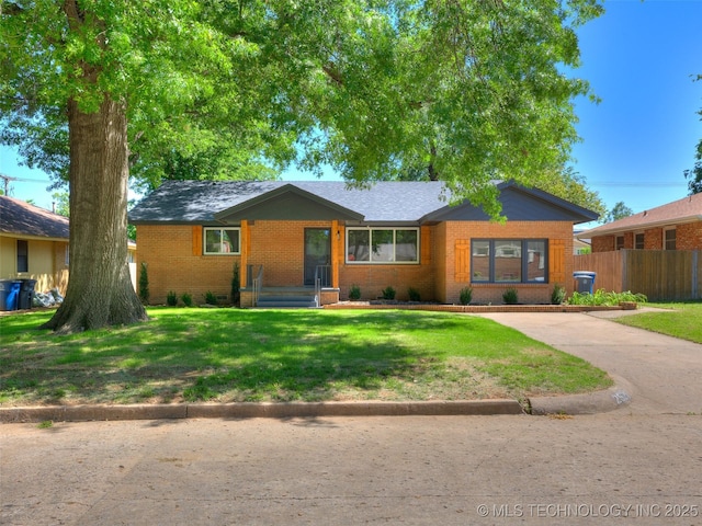 2528 E 57th St, Tulsa, OK 74105 - ranch-style house with brick siding and driveway
