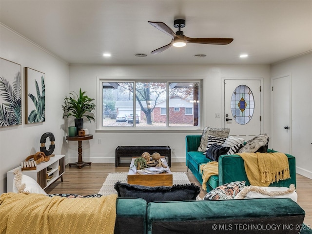 2528 E 57th St, Tulsa, OK 74105 - living room with wood finished floors, ceiling fan, baseboards, recessed lighting, and ornamental molding