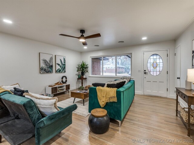 2528 E 57th St, Tulsa, OK 74105 - living room featuring a ceiling fan, light wood finished floors, and recessed lighting