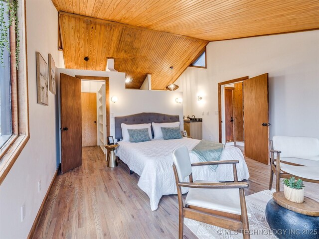 2528 E 57th St, Tulsa, OK 74105 - bedroom with wooden ceiling, vaulted ceiling, and wood finished floors