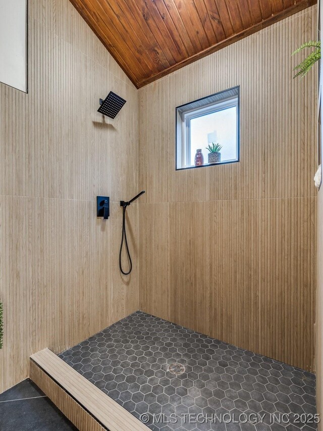 2528 E 57th St, Tulsa, OK 74105 - full bath featuring a tile shower, wood ceiling, lofted ceiling, and wooden walls