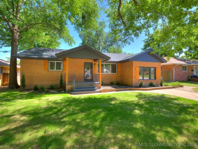 2528 E 57th St, Tulsa, OK 74105 - ranch-style home featuring brick siding