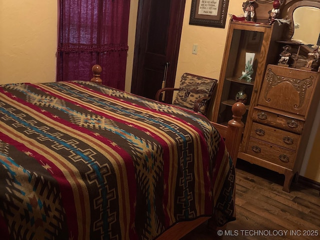1216 N Oak Grove Rd, Drumright, OK 74030 - bedroom with wood finished floors