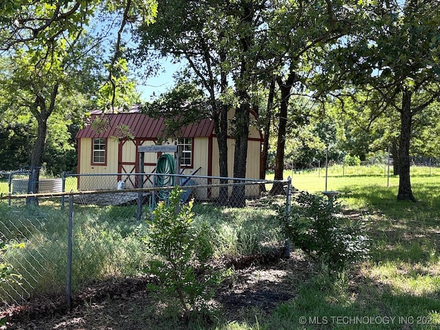 1216 N Oak Grove Rd, Drumright, OK 74030 - view of front of property featuring a storage shed and an outbuilding