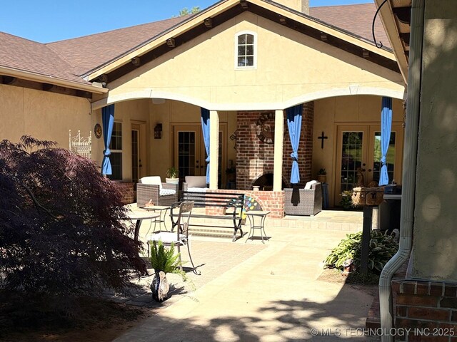 1216 N Oak Grove Rd, Drumright, OK 74030 - view of patio / terrace with french doors