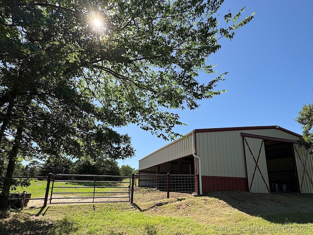 1216 N Oak Grove Rd, Drumright, OK 74030 - view of pole building with fence
