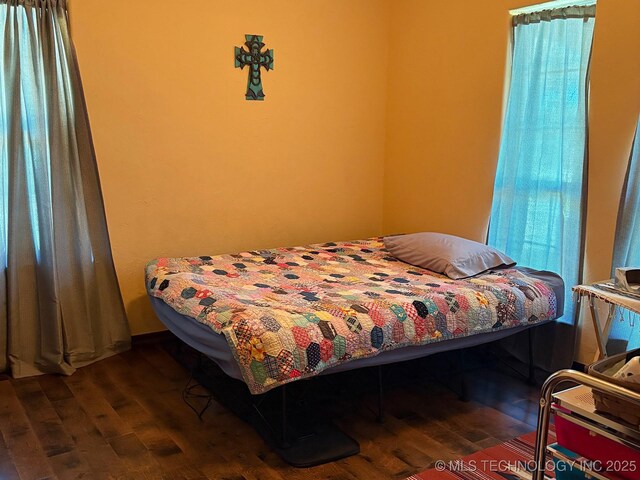 1216 N Oak Grove Rd, Drumright, OK 74030 - bedroom featuring wood finished floors