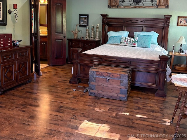 1216 N Oak Grove Rd, Drumright, OK 74030 - bedroom with wood finished floors