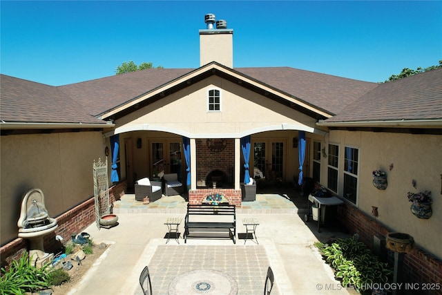 1216 N Oak Grove Rd, Drumright, OK 74030 - view of patio featuring french doors and an outdoor living space