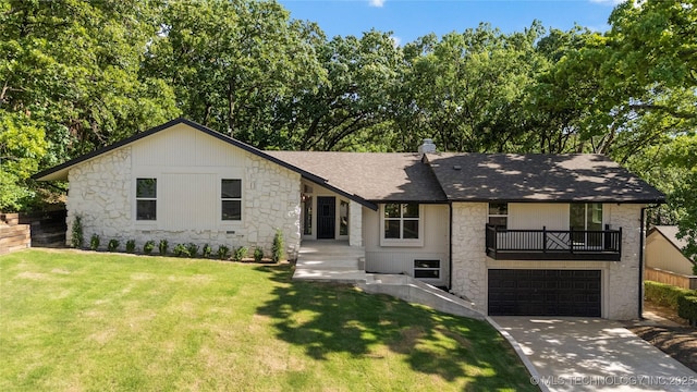3442 E 75th Pl, Tulsa, OK 74136 - view of front of home featuring stone siding, concrete driveway, roof with shingles, a front yard, and a garage