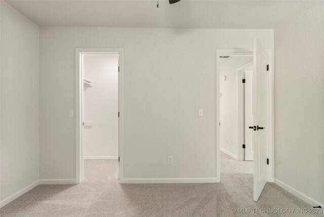 3442 E 75th Pl, Tulsa, OK 74136 - carpeted spare room with baseboards and a ceiling fan