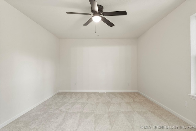3442 E 75th Pl, Tulsa, OK 74136 - unfurnished room with light colored carpet, ceiling fan, and baseboards