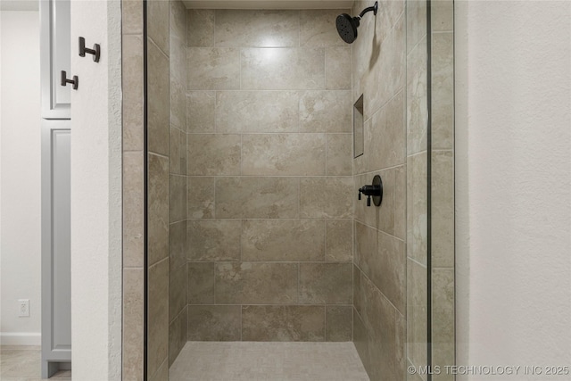 3442 E 75th Pl, Tulsa, OK 74136 - full bath with a shower stall and baseboards