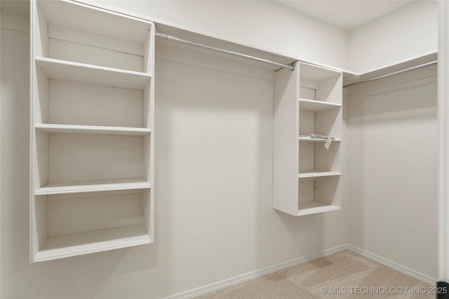 3442 E 75th Pl, Tulsa, OK 74136 - spacious closet with carpet flooring