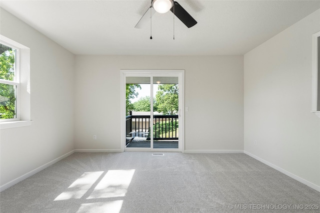 3442 E 75th Pl, Tulsa, OK 74136 - empty room featuring carpet floors, ceiling fan, and baseboards