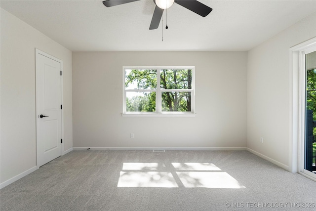 3442 E 75th Pl, Tulsa, OK 74136 - empty room featuring carpet, ceiling fan, and baseboards