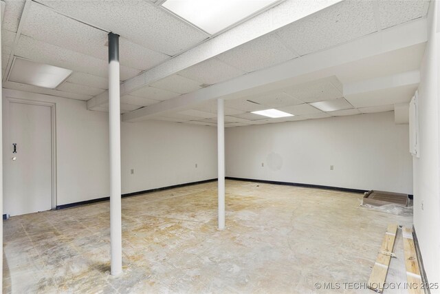 3442 E 75th Pl, Tulsa, OK 74136 - finished basement featuring a drop ceiling and baseboards