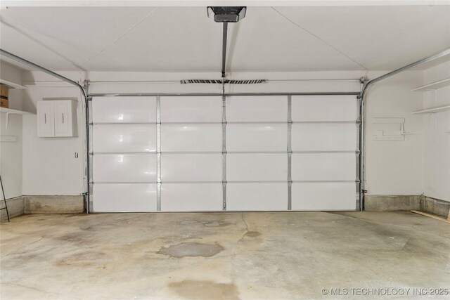 3442 E 75th Pl, Tulsa, OK 74136 - garage with a garage door opener