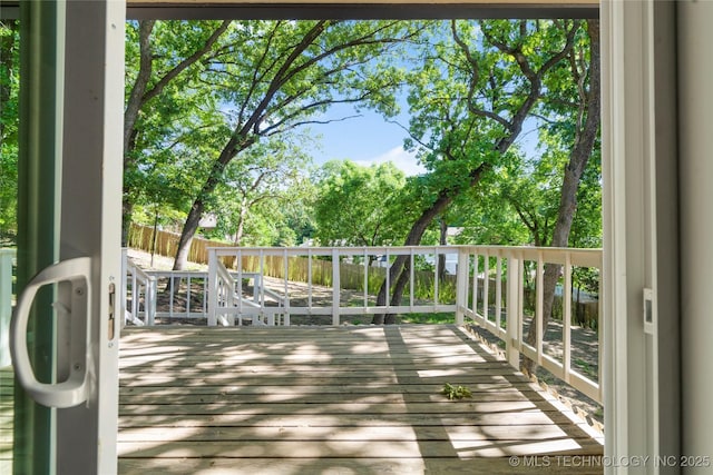 3442 E 75th Pl, Tulsa, OK 74136 - wooden terrace featuring a fenced backyard