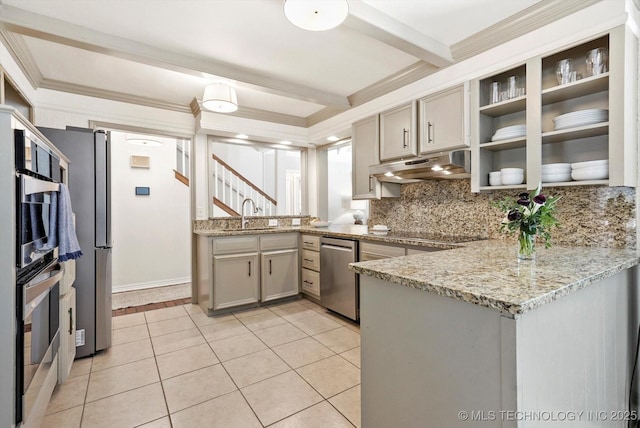 3606 E 70th Pl, Tulsa, OK 74136 - kitchen featuring under cabinet range hood, stainless steel appliances, a peninsula, tasteful backsplash, and ornamental molding
