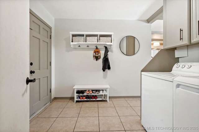 3606 E 70th Pl, Tulsa, OK 74136 - washroom featuring cabinet space, independent washer and dryer, baseboards, and light tile patterned flooring